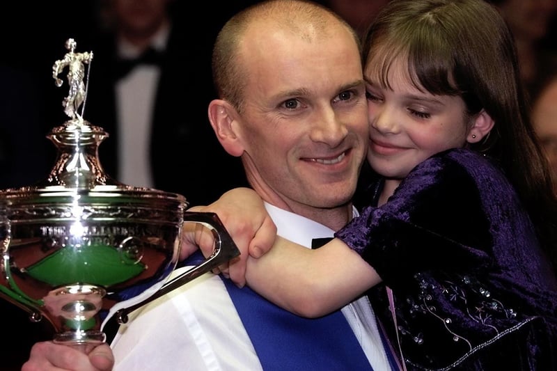 Peter Ebdon celebrated with a hug from daughter, Clarissa, after winning The Embassy World Snooker Championship Final at The Crucible in 2002.