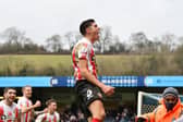 Ross Stewart celebrates at Wycombe Wanderers