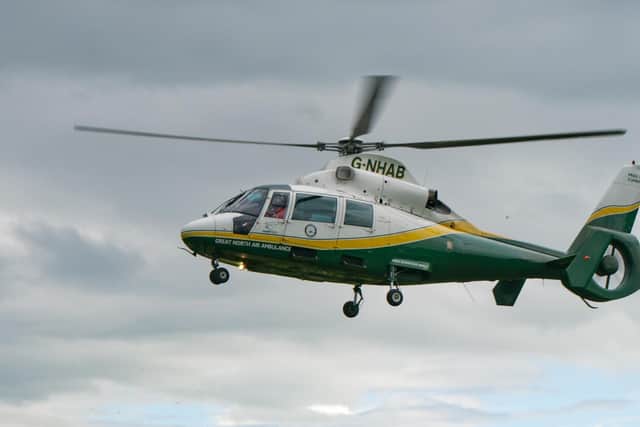 A casualty has been taken to hospital after the A1(M) was temporarily closed to allow the air ambulance to land.