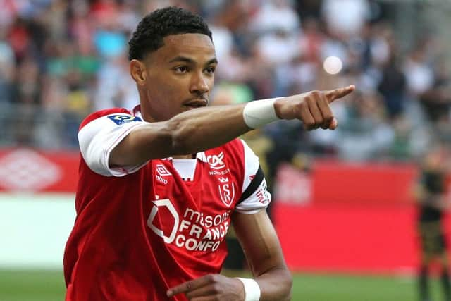 Reims' forward Hugo Ekitike celebrates after scoring a goal during the French L1 football match between Stade de Reims and OGC Nice at Stade Auguste-Delaune in Reims, northern France on May 21, 2022. (Photo by FRANCOIS NASCIMBENI / AFP) (Photo by FRANCOIS NASCIMBENI/AFP via Getty Images)