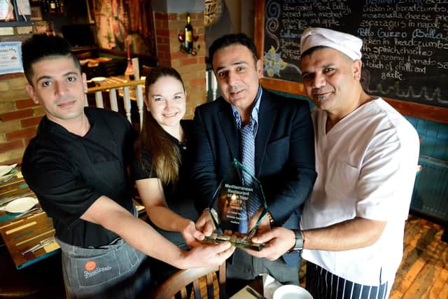 Payam Shabani from Da Vinci, with the Mediterranean restaurant of the Year award for 2019 along with staff (left to right) Karo Ali, Anastasija Solovjova and Mayid Mafi.