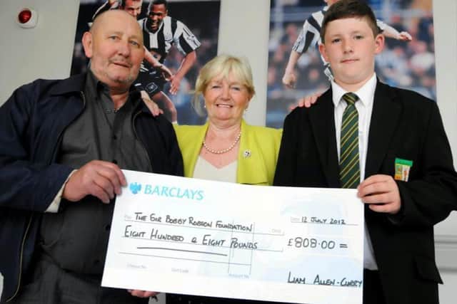 Liam Curry raising money on his Coast to Coast aged 14.