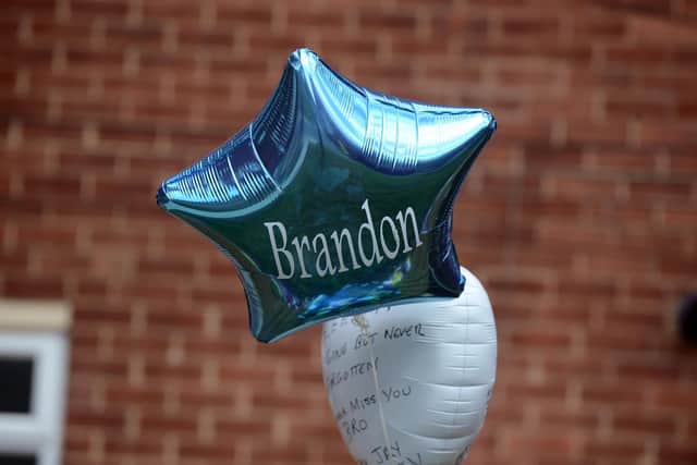 Balloons have been left among the tributes and messages to Brandon Lee outside the flats in Victoria Road, South Shields, after his death.