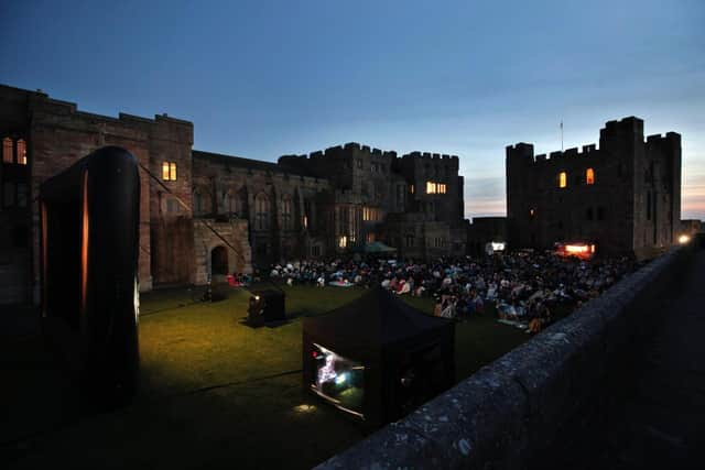 Open air film night at Bamburgh Castle. Photograph: Stuart Boulton. 