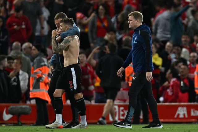 Newcastle United's English defender Kieran Trippier (L) and Newcastle United's English head coach Eddie Howe (R) leave after the English Premier League football match between Liverpool and Newcastle United at Anfield in Liverpool, north west England on August 31, 2022. (Photo by PAUL ELLIS/AFP via Getty Images)