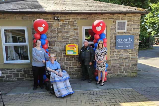 Sarah Johnson, Craigielea home manager, Paramedic Dave, Mayor Cllr Kath McCartney with resident Bria