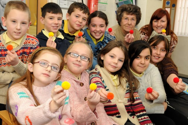 Lord Blyton Primary School pupils supported Age UK's Bobble Day in 2013. They were joined by chair of govenors Alice Malcolm and Age UK South Tyneside's Victoria Dunn, back right.