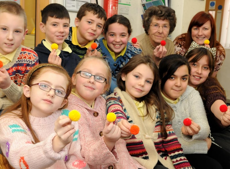 Lord Blyton Primary School pupils supported Age UK's Bobble Day in 2013. They were joined by chair of govenors Alice Malcolm and Age UK South Tyneside's Victoria Dunn, back right.