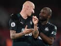 Newcastle United's English midfielder Jonjo Shelvey (L) and Newcastle United's Dutch defender Jetro Willems celebrate after the English Premier League football match between Sheffield United and Newcastle United at Bramall Lane stadium in Sheffield, northern England on December 5, 2019.