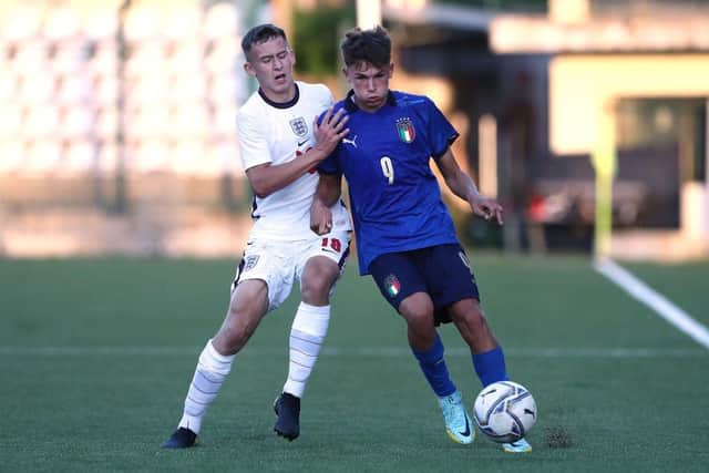 Chris Rigg in action for England U16s