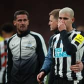 Newcastle United's Bruno Guimaraes of Newcastle United is consoled at the final whistle.