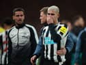 Newcastle United's Bruno Guimaraes of Newcastle United is consoled at the final whistle.
