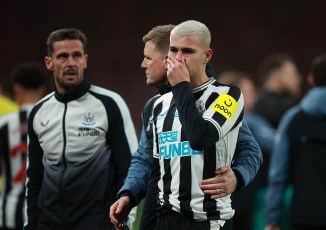 Newcastle United's Bruno Guimaraes of Newcastle United is consoled at the final whistle.