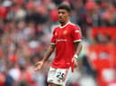 Jadon Sancho playing for Manchester United.