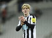 Newcastle United's Anthony Gordon applauds fans after the game.
