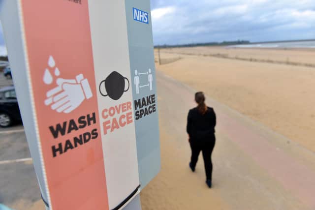 Covid guidance signs up at Sandhaven Beach, South Shields.