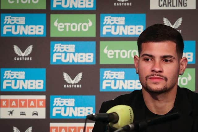 Newcastle United's Brazilian midfielder Bruno Guimaraes is presented to the media after newly signing in the club.  (Photo by SCOTT HEPPELL/AFP via Getty Images)