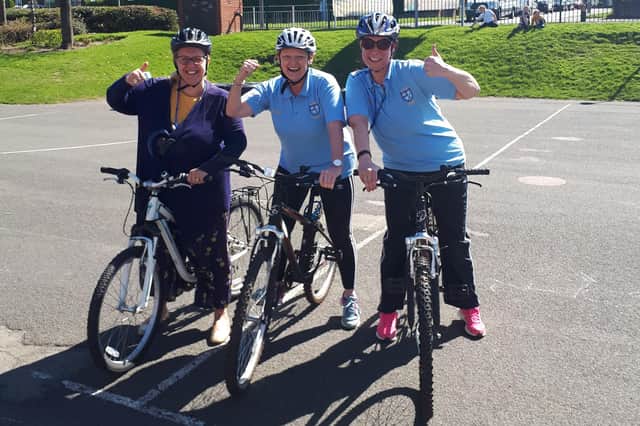 The team at St Mary's, who are inviting families to join their cycling sessions