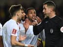 Arsenal's Kieran Tierney,  Mo Elneny and Gabriel appeal to referee David Coote during the Emirates FA Cup Third Round match between Oxford United and Arsenal at Kassam Stadium on January 09, 2023 in Oxford, England. (Photo by Stuart MacFarlane/Arsenal FC via Getty Images)