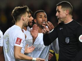 Arsenal's Kieran Tierney,  Mo Elneny and Gabriel appeal to referee David Coote during the Emirates FA Cup Third Round match between Oxford United and Arsenal at Kassam Stadium on January 09, 2023 in Oxford, England. (Photo by Stuart MacFarlane/Arsenal FC via Getty Images)