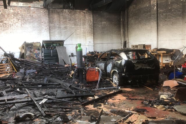 The extensive damage caused to Garden Lane Garage.

Photograph: TWFRS
