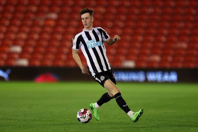 Joe White of Newcastle United U21 on the ball during the Papa John's Trophy match between Barnsley and Newcastle United U21 at Oakwell Stadium on September 20, 2022 in Barnsley, England. (Photo by George Wood/Getty Images)