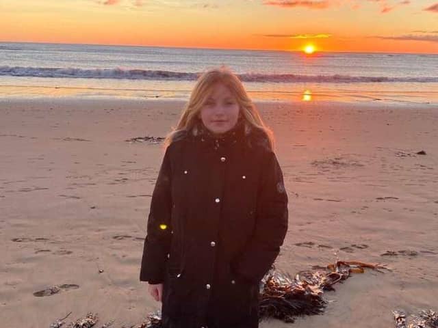 Tia was at the beach to do some litter-picking with mum Katy Alderson.
