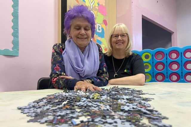 Carol (left) and Margaret sort out the pieces of their Jig Saw as Marsden Home Hub.  Picture by FRANK REID'