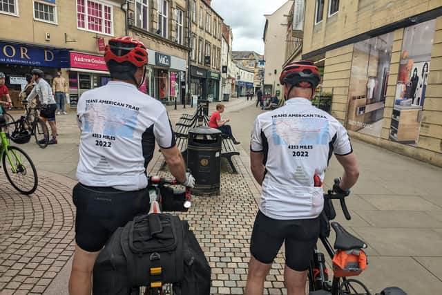 Colin and Steve with personalised cycling shirts ahead of the trip