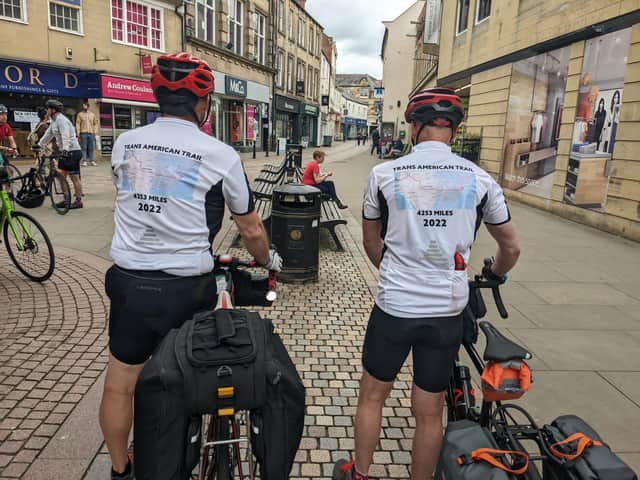 Colin and Steve with personalised cycling shirts ahead of the trip