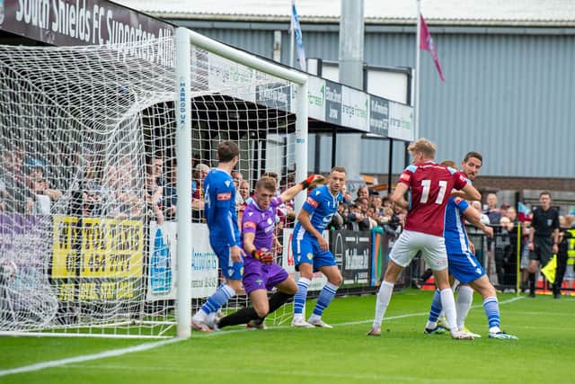 Alex Kempster prods in the first South Shields goal