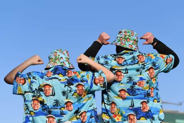 Fans of Newcastle United pose for a photo wearing Joelinton shirts prior to the Premier League match between Newcastle United and Arsenal at St. James Park  (Photo by Stu Forster/Getty Images)