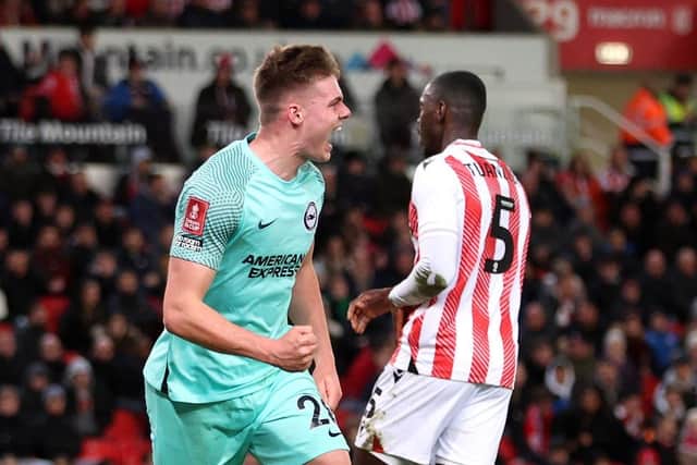 Evan Ferguson of Brighton & Hove Albion celebrates after scoring the team's first goal during the Emirates FA Cup Fifth Round match between Stoke City and Brighton and Hove Albion at Bet365 Stadium on February 28, 2023 in Stoke on Trent, England. (Photo by Nathan Stirk/Getty Images)