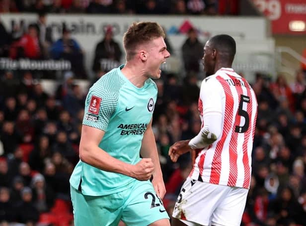 Evan Ferguson of Brighton & Hove Albion celebrates after scoring the team's first goal during the Emirates FA Cup Fifth Round match between Stoke City and Brighton and Hove Albion at Bet365 Stadium on February 28, 2023 in Stoke on Trent, England. (Photo by Nathan Stirk/Getty Images)