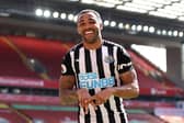 Callum Wilson of Newcastle United celebrates after scoring a goal which was later disallowed due to a handball during the Premier League match between Liverpool and Newcastle United at Anfield on April 24, 2021 in Liverpool, England.