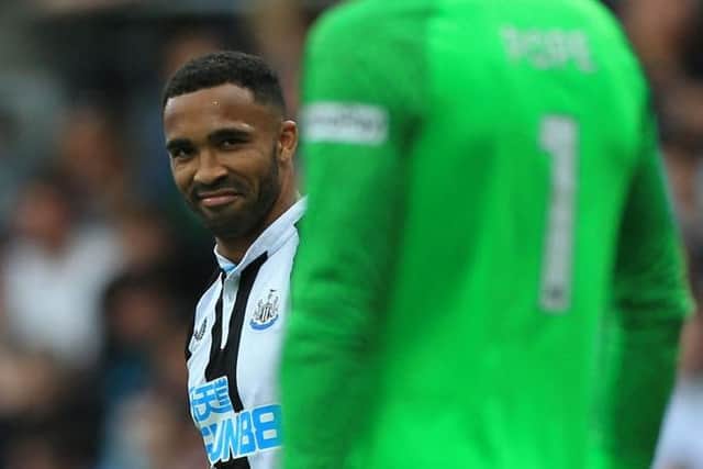 Newcastle United's English striker Callum Wilson glances at Burnley's English goalkeeper Nick Pope after scoring the opening goal from the penalty spot during the English Premier League football match between Burnley and Newcastle United at Turf Moor in Burnley, north west England on May 22, 2022. (Photo by LINDSEY PARNABY/AFP via Getty Images)