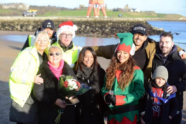 Jade Thirlwall, front row second from right, and Josef Craig, far right back row, with friends, family and members of the Cancer Connections charity