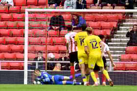 Anthony Patterson makes a late save at the Stadium of Light