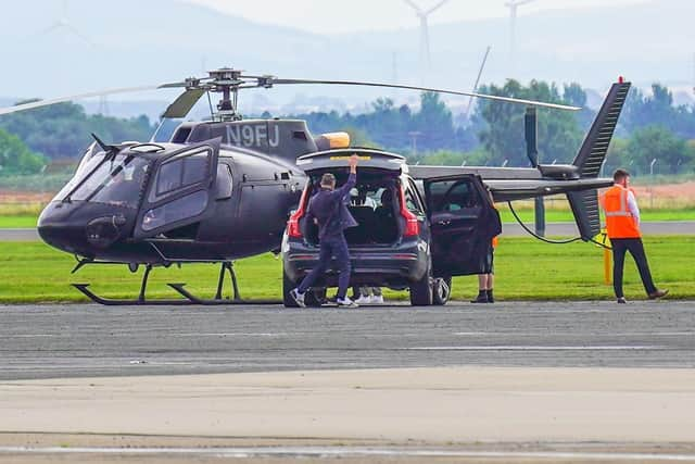 Tom Cruise appeared to pilot a helicopter.