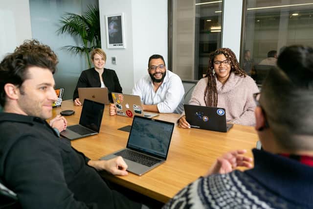 Office workers discussing ideas in a meeting