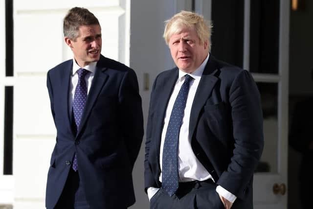 Boris Johnson with his Education Secretary Gavin Williamson. PA picture.