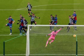 Crystal Palace's English defender Gary Cahill (L) scores his team's second goal during the English Premier League football match between Newcastle United and Crystal Palace at St James' Park in Newcastle-upon-Tyne, north east England on February 2, 2021.
