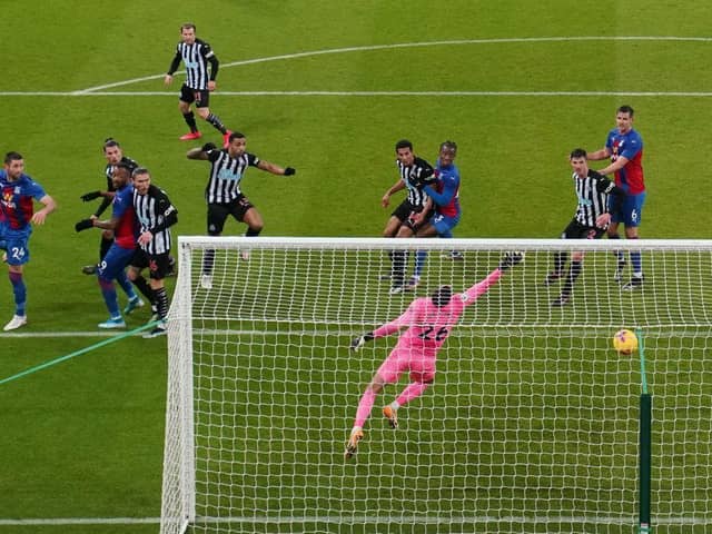 Crystal Palace's English defender Gary Cahill (L) scores his team's second goal during the English Premier League football match between Newcastle United and Crystal Palace at St James' Park in Newcastle-upon-Tyne, north east England on February 2, 2021.