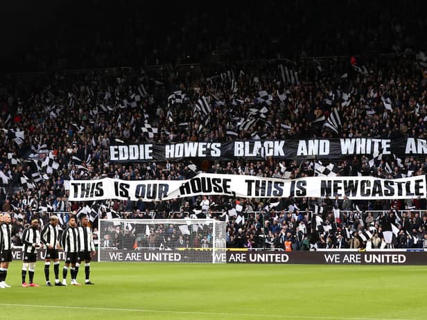 The Newcastle United team line up as fans display a welcome message to new manager, Eddie Howe, who was not able to attend after testing positive for Covid-19 prior to the Premier League match between Newcastle United and Brentford at St. James Park. (Photo by George Wood/Getty Images)