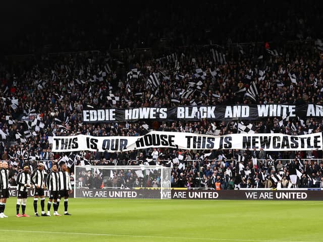 The Newcastle United team line up as fans display a welcome message to new manager, Eddie Howe, who was not able to attend after testing positive for Covid-19 prior to the Premier League match between Newcastle United and Brentford at St. James Park. (Photo by George Wood/Getty Images)