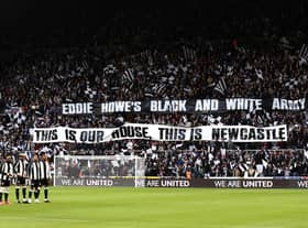 The Newcastle United team line up as fans display a welcome message to new manager, Eddie Howe, who was not able to attend after testing positive for Covid-19 prior to the Premier League match between Newcastle United and Brentford at St. James Park. (Photo by George Wood/Getty Images)