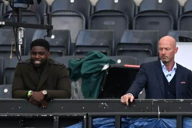 Former players and television presenters Micah Richards (L), Alan Shearer (R) at St James' Park (Photo by SHAUN BOTTERILL/POOL/AFP via Getty Images)