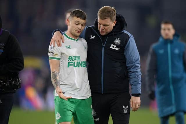 Newcastle United's Kieran Trippier speaks with head coach Eddie Howe after the final whistle.