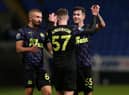 Elliot Anderson celebrates his second goal with team-mates.