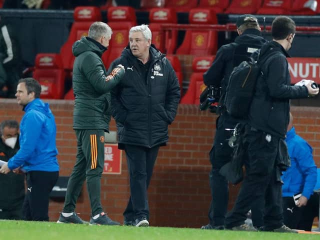 Steve Bruce and Ole Gunnar Solskjaer at the final whistle.